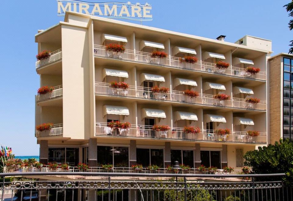 "a large hotel building with a sign that reads "" miramare "" prominently displayed on the front of the building" at Hotel Miramare