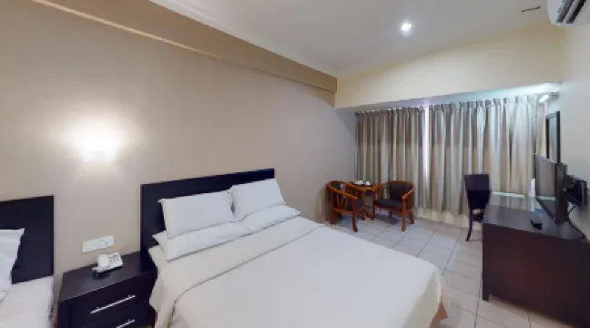 Megah d'Aru Hotel Отели рядом с достопримечательностью «Танджунг Ару»