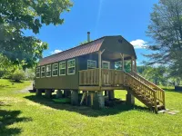 Meadow Riverfront Cabin Hotels in Wilderness