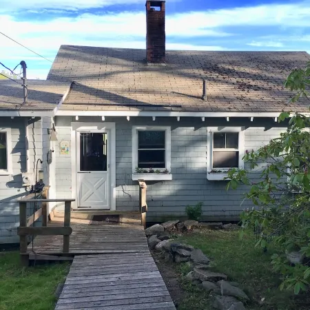 2 bedroom  1 bath, large deck and dock, on the water in peaceful cove,   Year