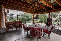 12 bedrooms Custom Home w/ 2 casita's, 18-hole chipping course & man-cave
