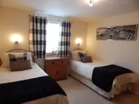 Beautiful spacious, split-level house near Fowey, heated swimming pool, hot tub