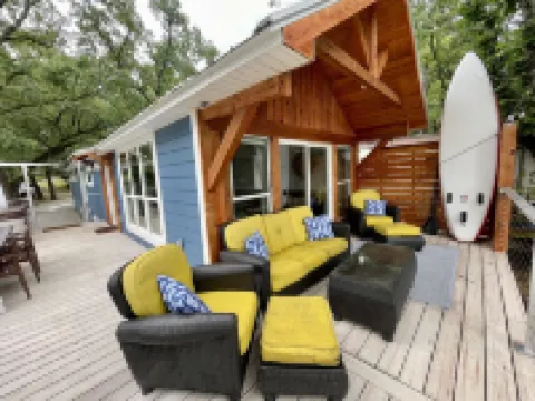 SHORT WALK TO WATER & NESTLED IN THE TREES THIS BEAUTIFUL CABIN HAS LAKE VIEWS