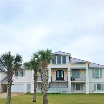 BEAUTIFUL WATERFRONT HOME WITH BOATHOUSE AND HUGE PORCHES!