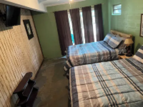 Two Story House with Deck over the River