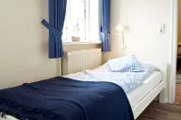 cozy u. family-friendly apartment in the artists' village of Oldsum Oldsum 호텔