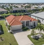 LOCATION!! Modern waterfront home;1-block to FishermanVillage; HEATED SALT POOL