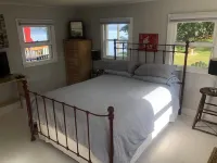 Cozy Cabin with 165 Ft Beach and Wood-Fired Hot Tub! Center of Flx Wine Country!