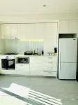 Central Melbourne Getaway with City View Balcony; near Tram Stop & Train Station