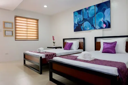 The Tavern Hotel Отели рядом с достопримечательностью «Don Honorio Ventura Technological State University, Sto. Tomas Campus»