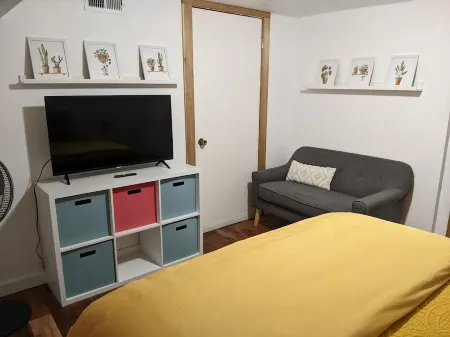 Lovely basement apartment with covered outdoor patio.