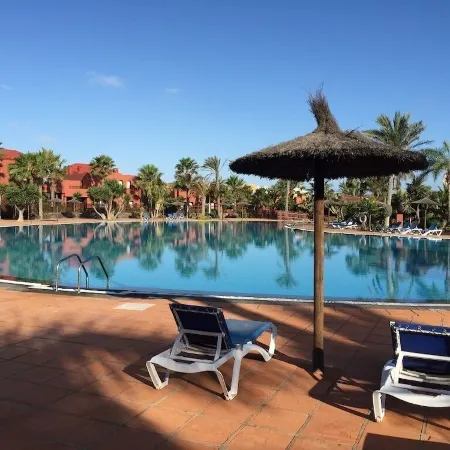 Holiday flat in a beautiful complex with large swimming pool and private terrace