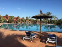 Holiday flat in a beautiful complex with large swimming pool and private terrace