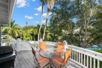 Community Pool Views and Spacious Verandas - Charming Island Retreat