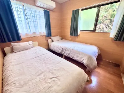 AZ Hotel Amami Island Hotels near Amami's Largest Banyan Tree