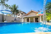 Linda Casa No condomínio Morada da Praia Hôtels à : Bertioga