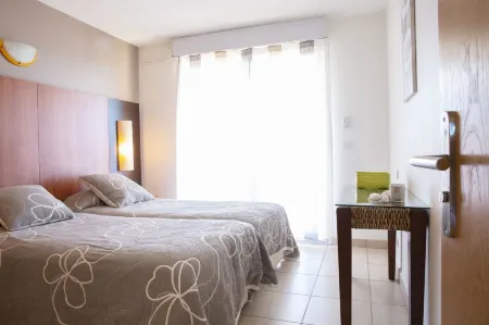 Résidence les Flamants Roses Отели рядом с достопримечательностью «Le Bleu 'N' Blue»