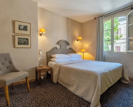 Hôtel de l'Amphithéâtre โรงแรมในอาร์ล