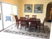 View of the Breezy Palms Waterfront Villa and infinity pool
