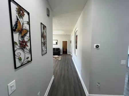 Modern and spacious getaway with a pool and grill