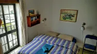 2-storey house with small garden and balcony