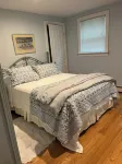 Cozy 1 bedroom with fenced in yard,  porch and association lake beach access