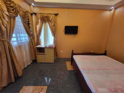 Luzmin BH - Beachfront Cottages Hotels near Our Lady of Immaculate Conception Church