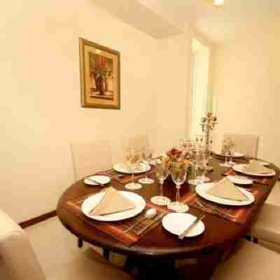 Deluxe 4Br Penthouse by Unique Towers Dining/Meeting Rooms