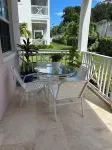 Breathtaking Poolfront 3-Bedroom Condo, Just 8-Min Walk to Pristine Beach!