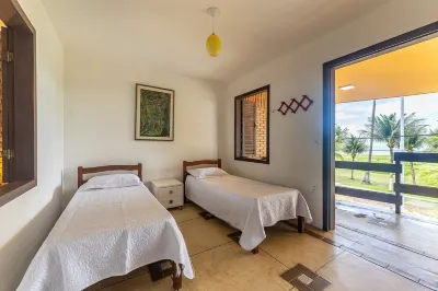 Casa Rustica 4qt beira mar e piscina 156 のホテル