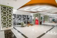 Studio Room with Netflix at Apartemen Grand Kamala Lagoon by Apartemenku