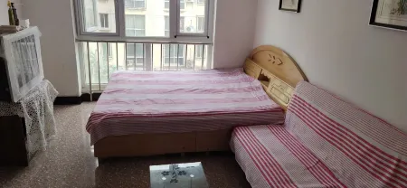 Facing the Sea, Spring Blossoms Nier Apartment (Xinkai Road) Отели рядом с достопримечательностью «Hebei Institute of International Business and Economics - Comprehensive Building»