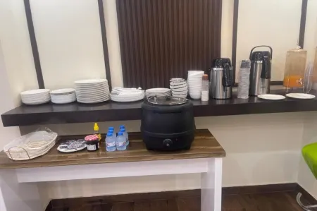 OYO Townhouse 156 Rose Hotel Apartments