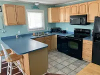 2nd Floor 3 BR Condo Close to the beach with Pool!