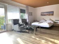 Feel-EC Ap. in the anchor house directly on the Siel - barrier-free Hotels in Greetsiel