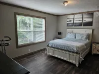 Charming, private 3-BR home in lovely Coldspring with WiFi and fenced yard.