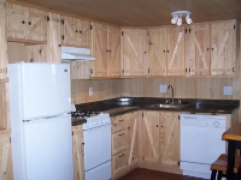 Located Behind a Tree Filled Garden Near Our Horse Barn and Farm Sanctuary. Hotels in Swan Township