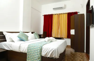 Puthens Clifton Inn Hotels in Ettumanoor