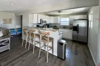 At Coastal Casa enjoy the waves, the breeze, and a quick walk to the sand.