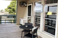 Cozy A-Frame Cabin on False River Party Barges Available on Request