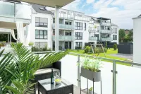 Fairmieten: Moderne Suite mit Balkon und Parkplatz