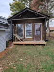 Tiny house on the lake With a seventy five inch t v free internet  walk shower