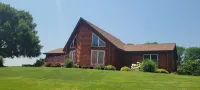 Log Cabin located minutes from Missouri River, airport, I-90,  and downtown.