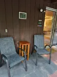 Beautiful cabin situated on wooded land with nice yard clearing and small stream