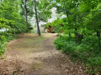 cozy lake house, full log cabin on beautiful shell lake, w/ wonderful loft.