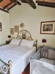 Tuscan stone villa with private pool surrounded by greenery