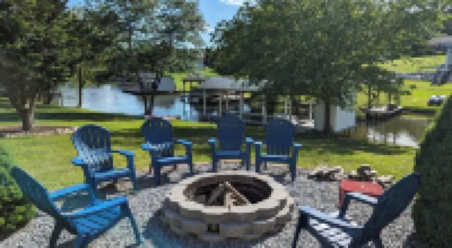 Spacious lakefront home with private boathouse and game room!