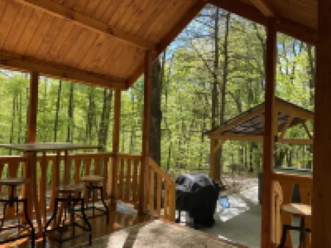 Secluded Log Cabin with Premium Hot Tub under Gazebo