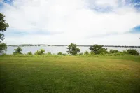 Prime Lakefront East Okoboji Condo at Bridges Bay Jet Ski Lift rental available!
