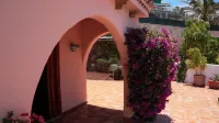 Luxury villa with private heated pool in private garden. Close to beaches.